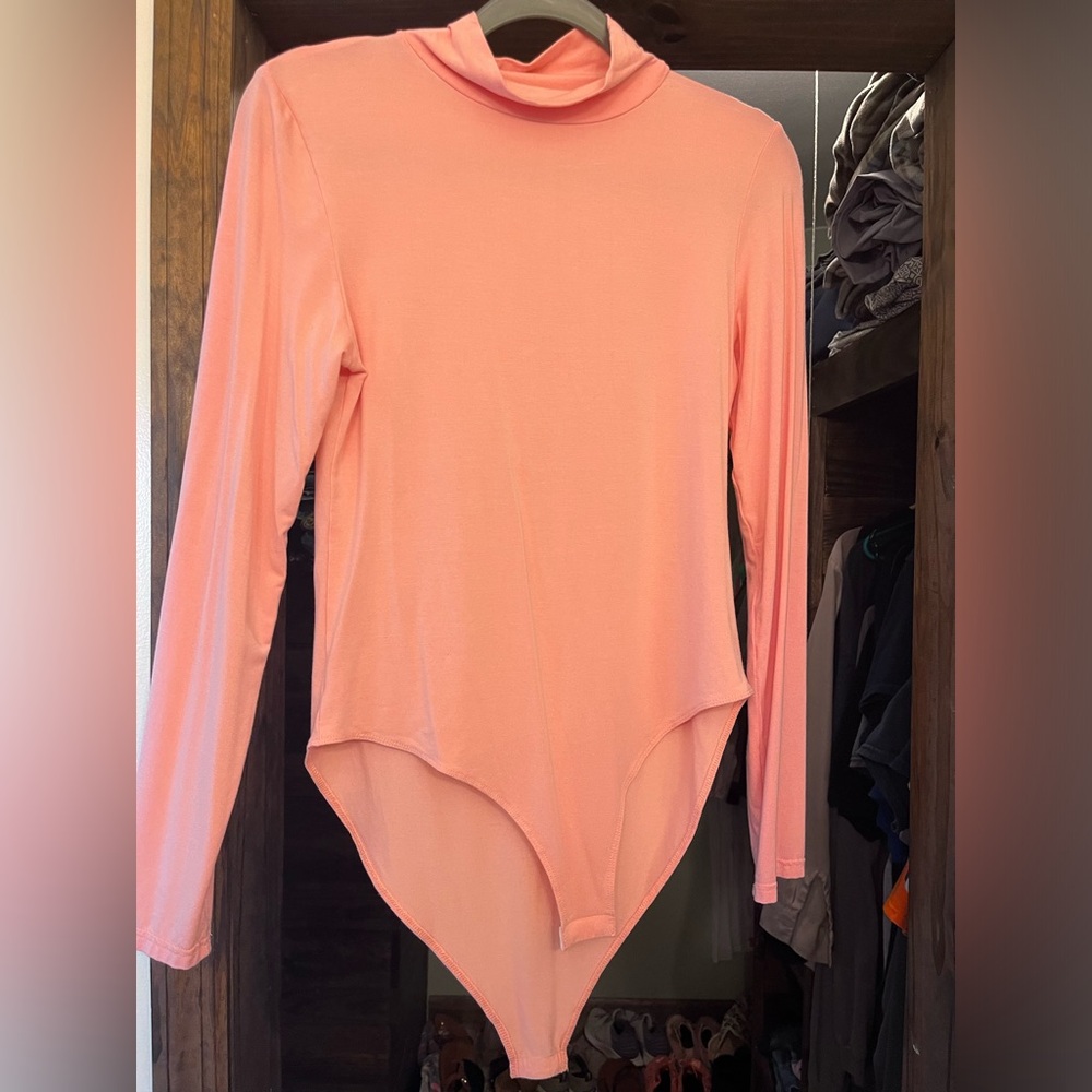 NEW, never worn, Women’s bodysuit